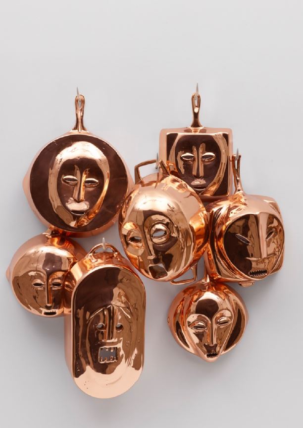 copper skillets with faces